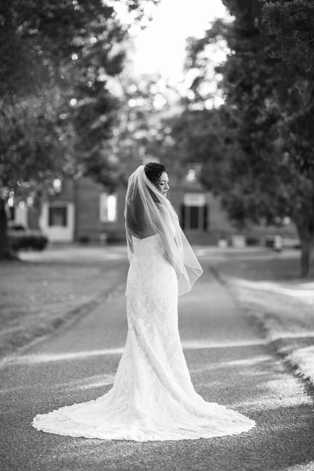 bride on sidewalk black and white portrait