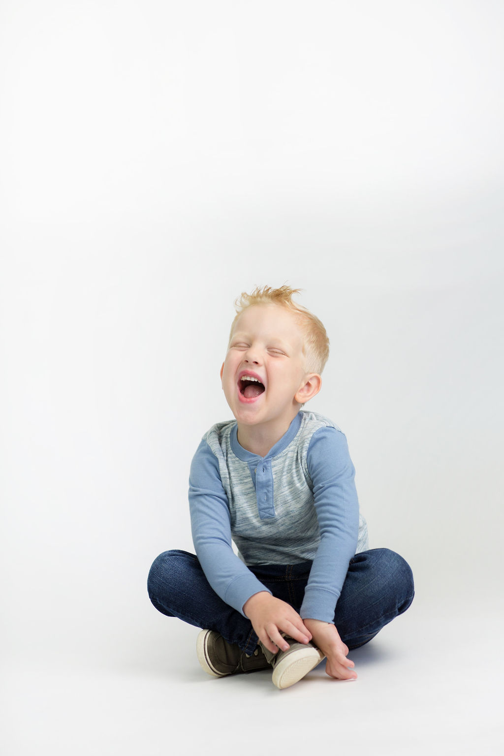 laughing boy studio portrait
