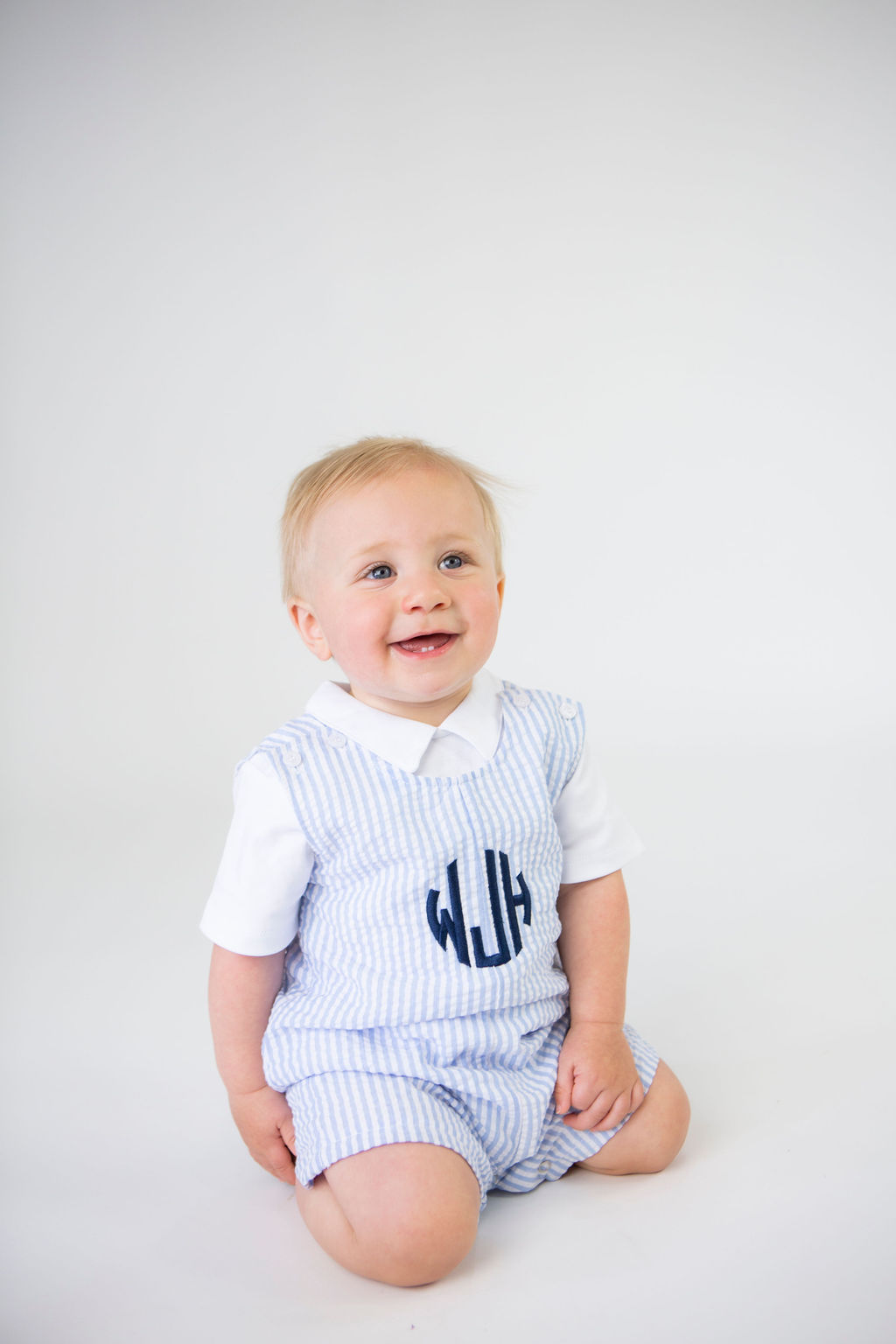 toddler in mongrammed jumper portrait