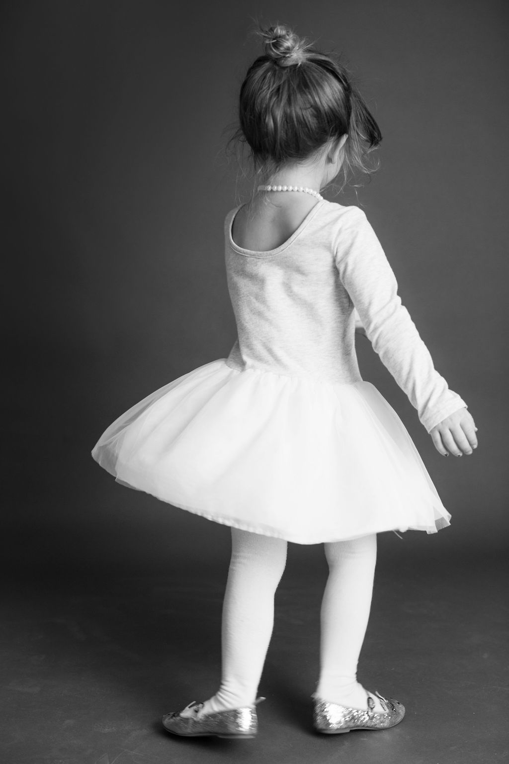 young dancer spinning in dress